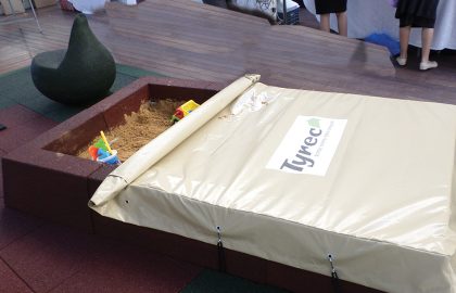 Safety sandbox with a dedicated cover